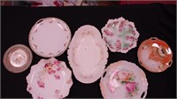 Seven pieces of decorative china: cake plates,
