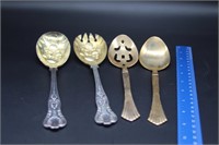 4 Serving Spoons gold in color