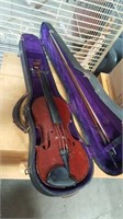 old violin in a case