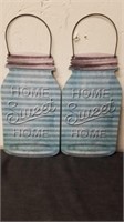 Two 5 x 12" metal home sweet home canning jar