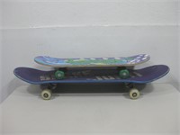 Two Skateboards Largest 8.25"x 32"x 5"