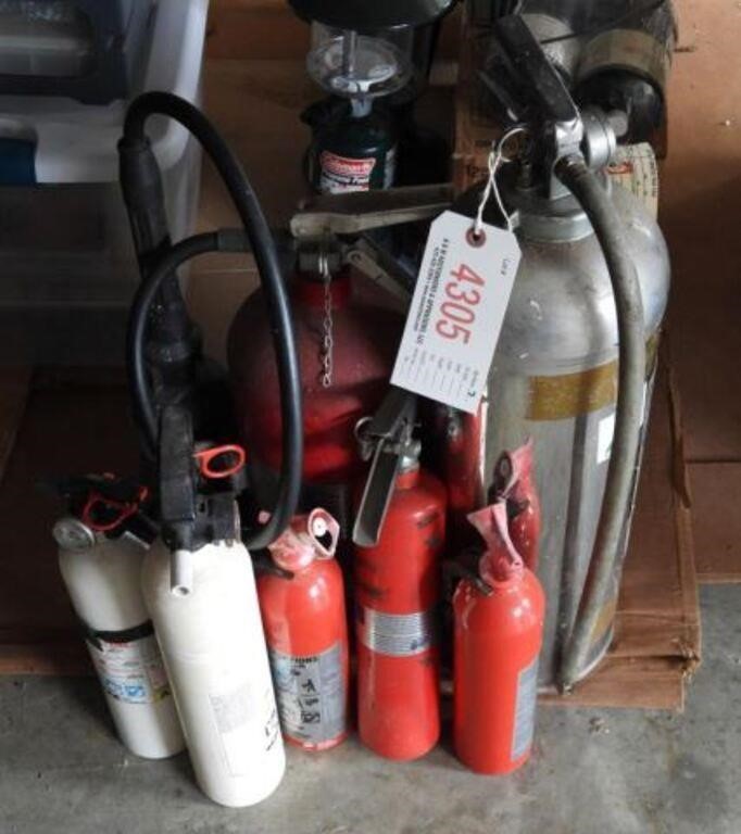 (7) fire extinguishers in various sizes