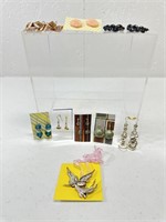 Jewelry includes 9 Pairs of Earrings & 1 “Bless