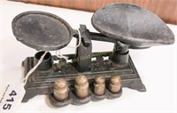 Miniature cast-iron balance scale