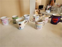 8 Grandma & Grandpa themed coffee mugs. Dining roo