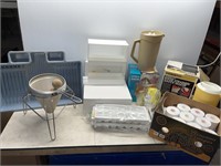Spice rack, juicer, ice trays, adding machine