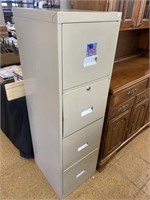 Metal filing cabinet.