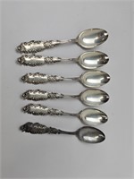six 5 1/2" sterling spoons, 123.6 grams