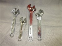 adjustable wrenches .