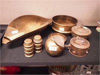 Eight brass items including a scale pan; sieve;