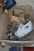 large tote of staple guns and staples