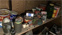 Contents of shelf with tins,etc.