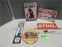 Assorted metal signs