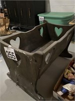Doll cradle with heart cut out design