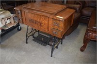 Antique White Sewing Machine in Oak Cabinet