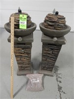 2 Decorative propane tiki torches w/ lava rocks