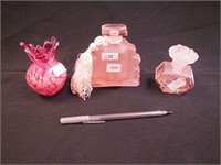 Two pink glass perfume bottles: 3 1/2" with