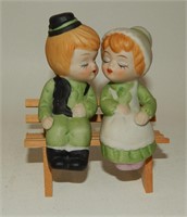 Kissing Irish Lad & Lass on Wooden Bench