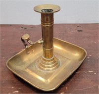 Brass push-up candlestick