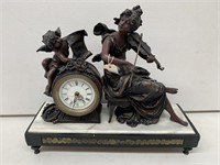 Resin Clock on Stone Base. Lady playing Violin