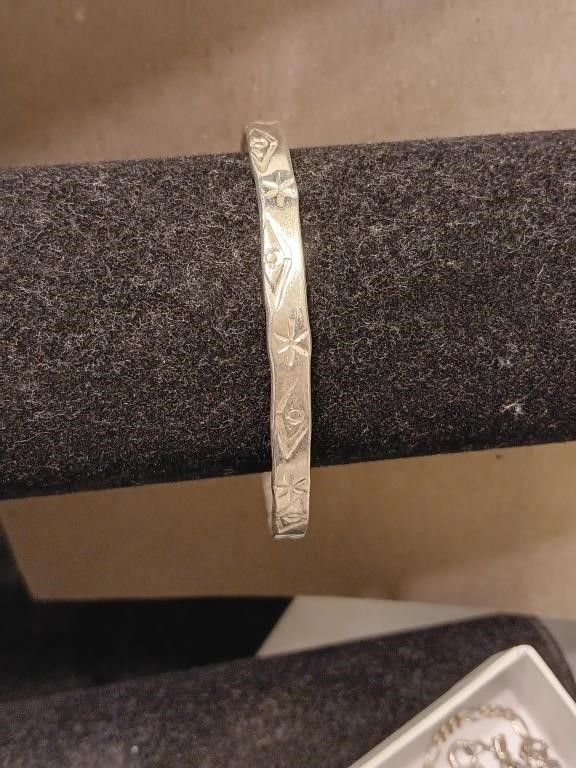 Sterling silver bangle bracelet  opening is 2.5"