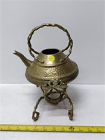 brass tea pot on stand