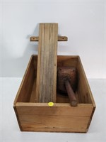 primitive clothes dryer, wooden masher, and box