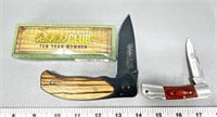 (2) pocket knives NRA and Cabela’s 10 year club