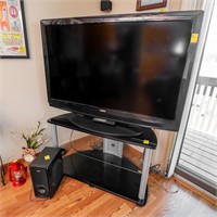 Sanyo 55" TV w/ Surround System and TV Stand