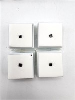 Four 0.33ct black diamond gemstones