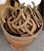 Vintage Rusty Bucket Filled With Horseshoes