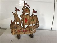 ANTIQUE CAST IRON SHIP DOORSTOP - ITS AN OLD ONE