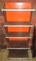 Retro shelf unit with orange back and 5 levels of