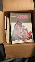 Box lot of books including apes and monkeys book