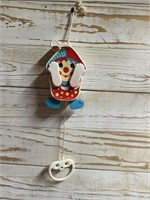 VINTAGE MUSICAL CLOWN PULL PEEK-A-BOO TOY