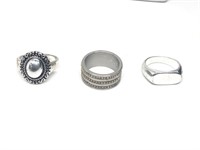 Three Silver Colored Rings