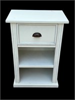 A White Wood Nightstand w/ Drawer & Shelves