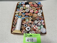 Sewing thread (many wood spools) and bobbins