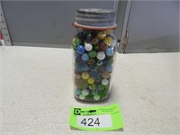 Canning jar full of marbles