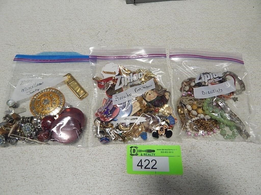 Pins, bracelets and other assorted costume jewelry