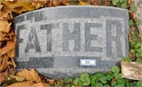 "Father" engraved granite headstone: