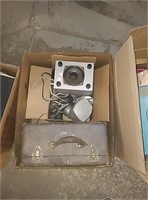 Box with brief case, speakers, and more