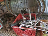 milk crate of bicycle parts/pieces