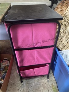 Pink storage containers with sand