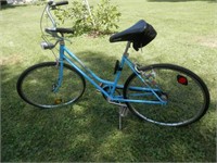 One-Ladies blue Schwinn bike w/headlight
