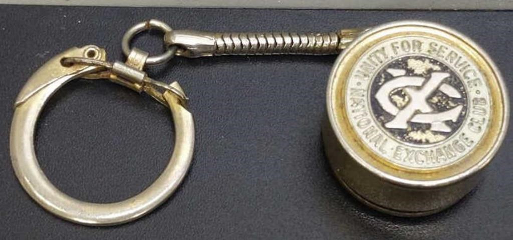 National exchange club nickel holding keychain