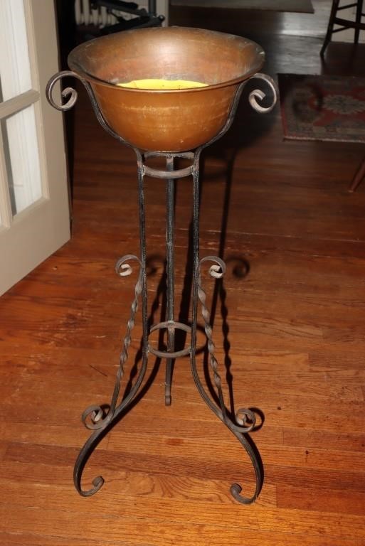Copper planter on wrought iron stand and a