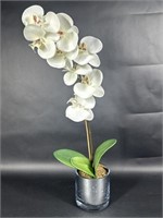 Faux Orchids in a Plastic Vase