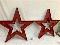 2 metal hanging stars with lights 32” tall