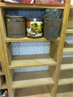 Shelf of metal buckets